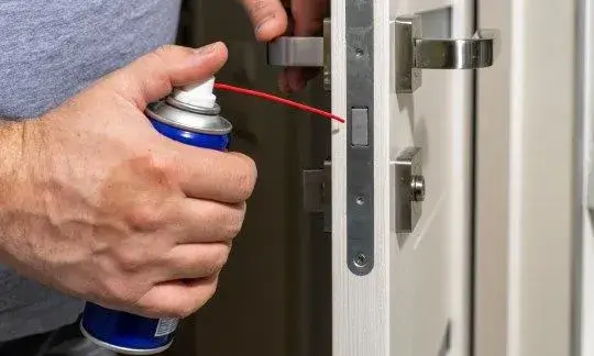 common lock problem in Rockland County hand holding a spray