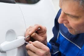 Locksmith technician providing residential lock repair service in Mount Vernon NY