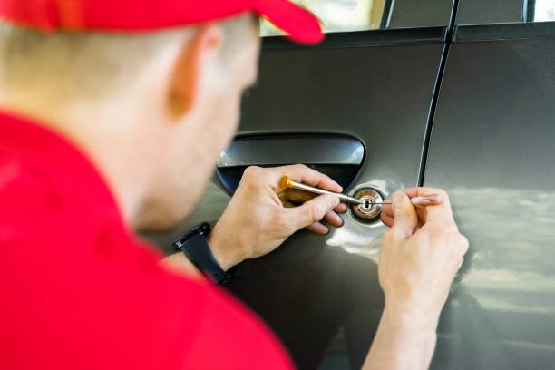 Locksmith technician repairing a commercial lock in Nyack, NY.