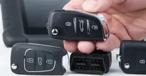 hand with key holding one